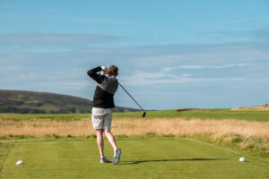 Action shot on the tee at Machrie Golf Links